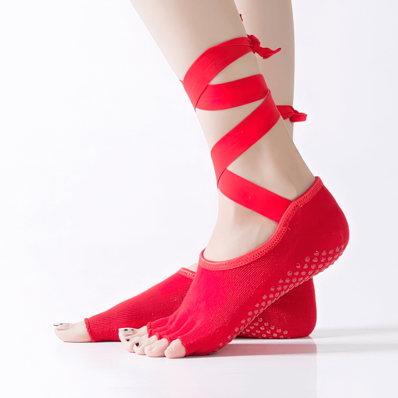 Red women's elastic non-slip yoga socks with open toes and ties, featuring a secure grip and breathable cotton-spandex blend.